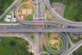 Aerial view of highway junctions Top view of Urban city, Bangkok at evening, Thailand. Car and truck across road junction, traffic Royalty Free Stock Photo