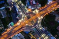 Aerial view of highway junctions Top view of Urban city, Bangkok at night, Thailand