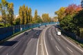 Aerial view of highway with multiple lanes and cars. Cars on highway road in busy city, urban view Royalty Free Stock Photo