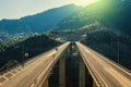 Aerial view on a highway near the city of Metsovo in the sunset beams Royalty Free Stock Photo