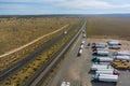 Aerial view of highway rest area with large car park for cars trucks top view of highway in desert Arizona Royalty Free Stock Photo