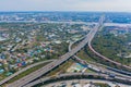 Aerial view of highway street roads in Bangkok Downtown skyline, Thailand. Financial business district and residential area in