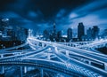 Aerial view of highways in Shanghai Downtown, China. Financial district and business centers in smart city in Asia. Top view of