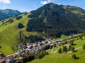 Aerial view of Hinterglemm village and mountains with skiing lifts in Saalbach-Hinterglemm skiing region in Austria on a