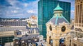 Aerial View of Historic Clock Tower and Modern Skyscraper in Cityscape Royalty Free Stock Photo