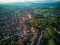 Aerial view of the historic Tuscan city skyline under a bright sky in Arezzo, Italy