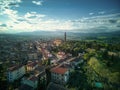Aerial view of the historic Tuscan city skyline under a bright sky in Arezzo, Italy