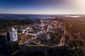 Aerial view of the historic village of Monsaraz in Alentejo with the Alqueva dam reservoir on the background Royalty Free Stock Photo