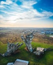 Aerial view of the historical Ninth Fort memorial under the cloudy blue sky in Lithuanian