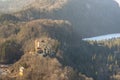 Aerial view of the Hohenschwangau Castle in beautiful sunshine on a sunny day in winter from the Neuschwanstein Castle, Schwangau