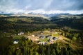 Aerial view of holiday cottages in mountains. Royalty Free Stock Photo