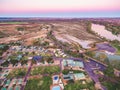 Aerial view of holiday park on shore of Murray River. Royalty Free Stock Photo