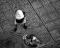 Aerial view of homeless Vietnamese woman in conical hat