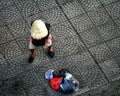 Aerial view of homeless Vietnamese woman in conical hat