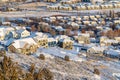 Aerial view of homes in a residential neighborhood blanketed with snow in winter Royalty Free Stock Photo