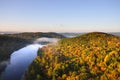 An aerial view of a hot air balloon floating over the Vermont country side