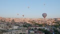 Aerial view from hot air balloon during Sunrise over the fairytale landscape hills of Kapadokya with morning light. Royalty Free Stock Photo