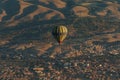 aerial view of hot air balloon over fairy chimneys, Royalty Free Stock Photo