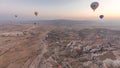 Aerial view from hot air balloon during Sunrise over the fairytale landscape hills of Kapadokya timelapse hyperlapse