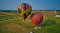 Aerial View of Hot Air Balloons Trying to Launch in a Wind as Seen by a Drone