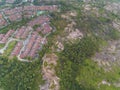 An aerial view of house estate with green surounding