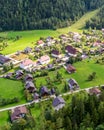 Aerial view of the houses in Hallstatt, Austria, surrounded by green fields Royalty Free Stock Photo