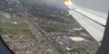 Aerial view of houses inside an airplane Royalty Free Stock Photo