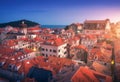 Aerial view of houses with red roofs at sunset in Dubrovnik Royalty Free Stock Photo