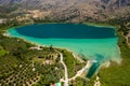 Aerial view of a huge freshwater lake surrounded by tall mountains Lake Kournas, Crete, Greece Royalty Free Stock Photo