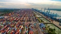 Aerial view of huge industrial port with containers and huge ship. Logistic. Shipping. Cargo