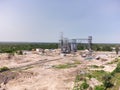 Aerial view of huge modern grain elevator. Food storage, building in progress. Silo farm. Agribusiness development Royalty Free Stock Photo