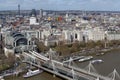 Aerial view of Hungerford Bridge and Golden Jubilee Bridges over the River Thames in London, England, UK