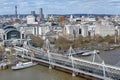 Aerial view of Hungerford Bridge and Golden Jubilee Bridges over the River Thames in London, England, UK