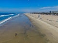 Aerial view of Huntington Beach and coastline during summer day