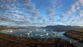 Aerial view of icebergs floating out to sea at Jokusarlon Glacial Lagoon, Southeast Iceland Royalty Free Stock Photo