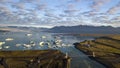 Aerial view of icebergs floating out to sea at Jokusarlon Glacial Lagoon, Southeast Iceland Royalty Free Stock Photo