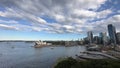 an aerial shot of sydney and the opera house in front of a body of water