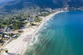 Aerial view of idyllic Golden beach toward the headland at Skala Potamia, Thassos, Greece