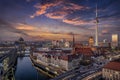 Aerial view of the illuminated Berlin skyline and Spree river during beautiful sunset