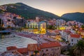 Aerial view on illuminated coastline and old town at night in Budva, Montenegro