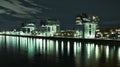 Aerial view of illuminated crane houses by the canal at the Zollhafen in Cologne, Germany at night