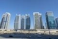 Aerial view of illuminated JLT skyscrapers. Towers along Sheikh Zayed Road.