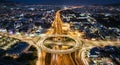 Aerial view of a illuminated multilevel junction ring road as seen in Attiki Odos, Athens Royalty Free Stock Photo