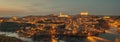 Aerial view illuminated with night street lights Toledo city. Spain