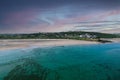 Aerial view of Inchydoney beach near Clonakilty in Ireland with people in the turquoise water Royalty Free Stock Photo