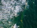 Aerial view of indistinguisable man surfing in Barra da Tijuca Royalty Free Stock Photo