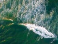Aerial view of indistinguisable man surfing in Barra da Tijuca beach Royalty Free Stock Photo