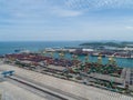 Aerial view of industrial port with containers, Large container vessel unloaded in Port. Royalty Free Stock Photo