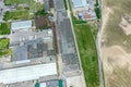 Aerial view of industrial warehouse zone in suburb area Royalty Free Stock Photo