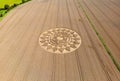 Aerial view of an intricate geometric crop circle formation in a wheat field in Wiltshire, England Royalty Free Stock Photo